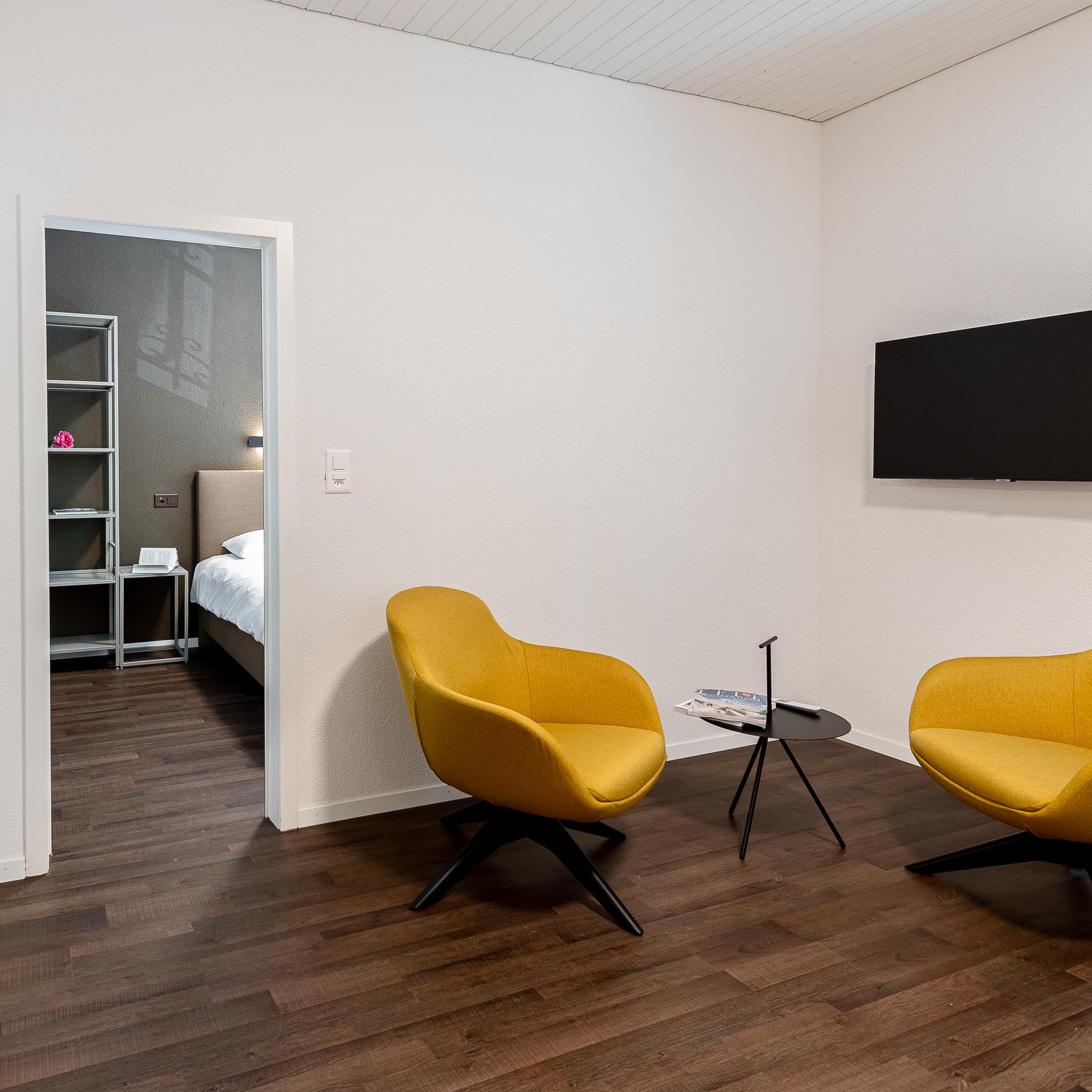 Living room with yellow armchairs